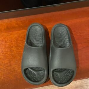 Super comfortable Oofos recovery slides.